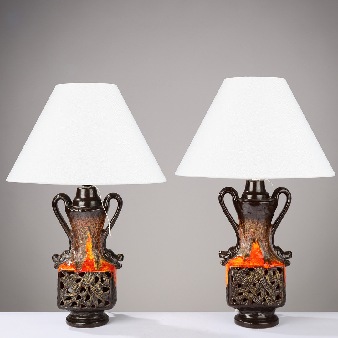 A pair of perforated table lamps in glazed ceramic decorated with Celtic inspiration, presumably German lamp manufacturer, 1970s, (2).