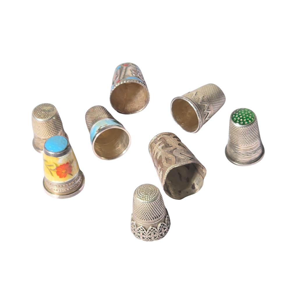 Colección de ocho dedales en plata y esmalte. Principios siglo XX.