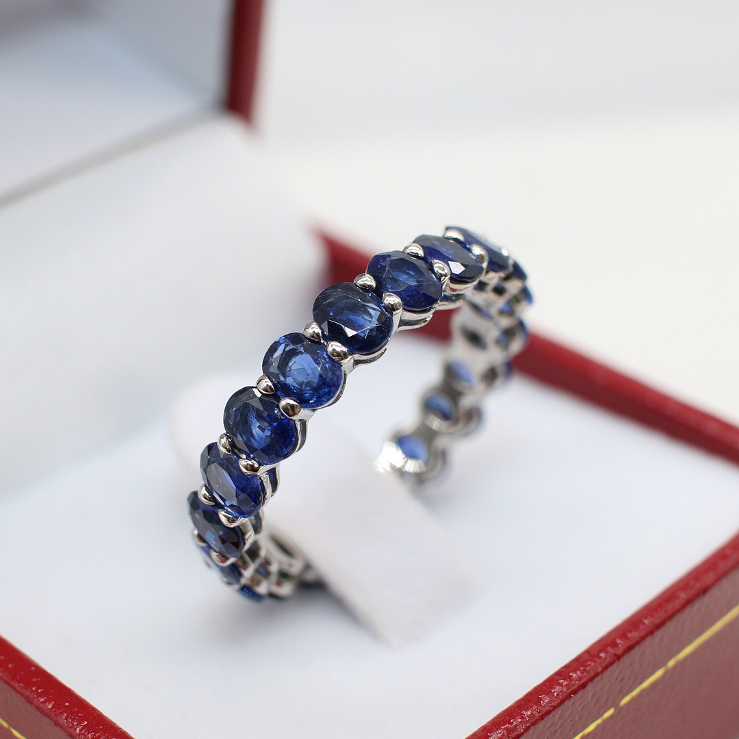 SAPPHIRE & PLATINUM FULL ETERNITY RING.