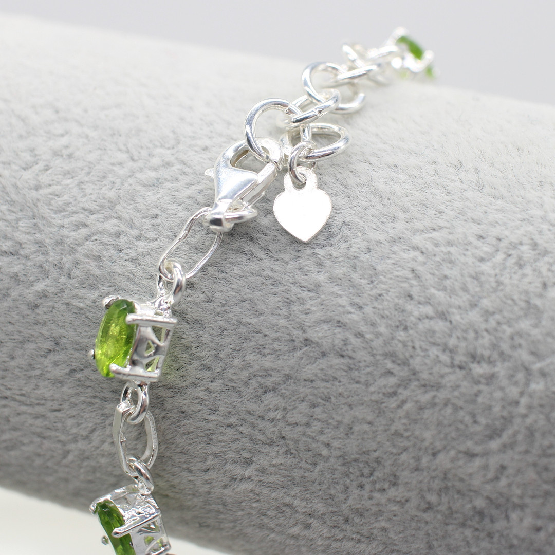 PERIDOT SET SILVER DRESS BRACELET.