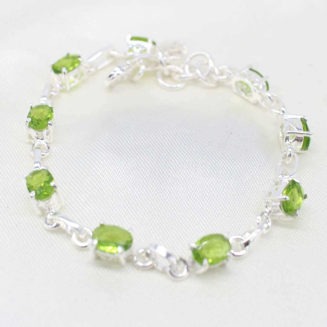 PERIDOT SET SILVER DRESS BRACELET.