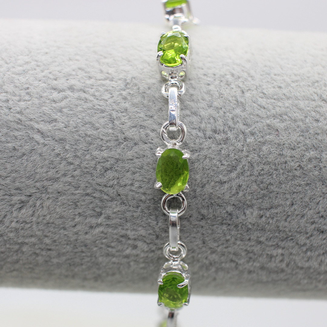 PERIDOT SET SILVER DRESS BRACELET.