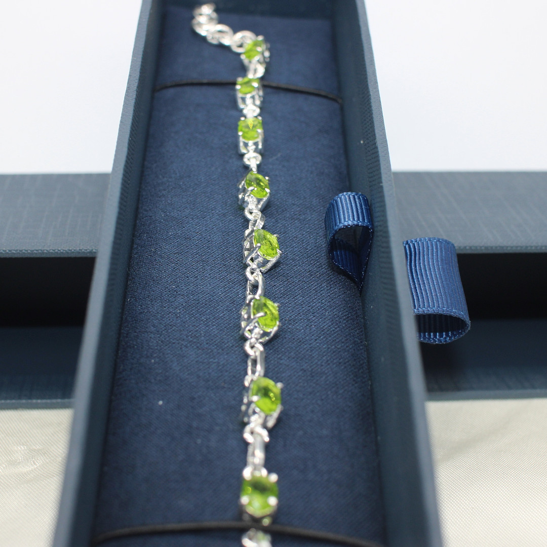 PERIDOT SET SILVER DRESS BRACELET.