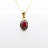 RUBY & DIAMOND PENDANT NECKLACE.