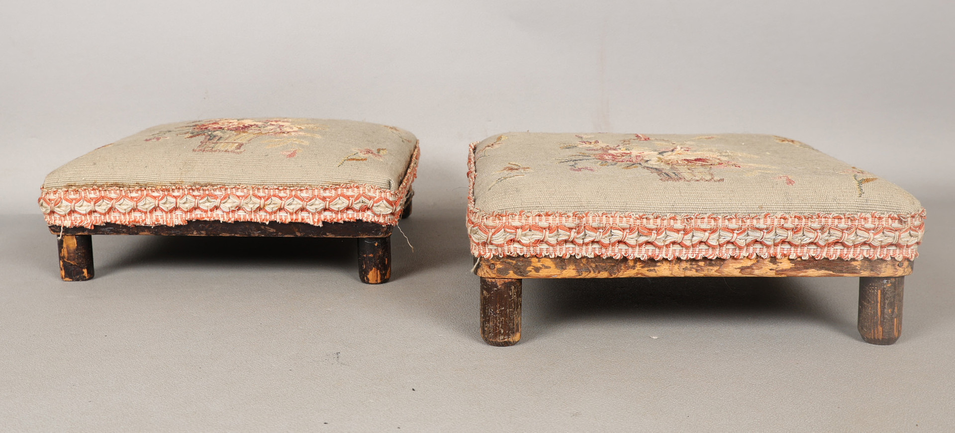 A PAIR OF LATE 19TH/EARLY 20TH CENTURY NEEDLEWORK FOOTSTOOLS (2).