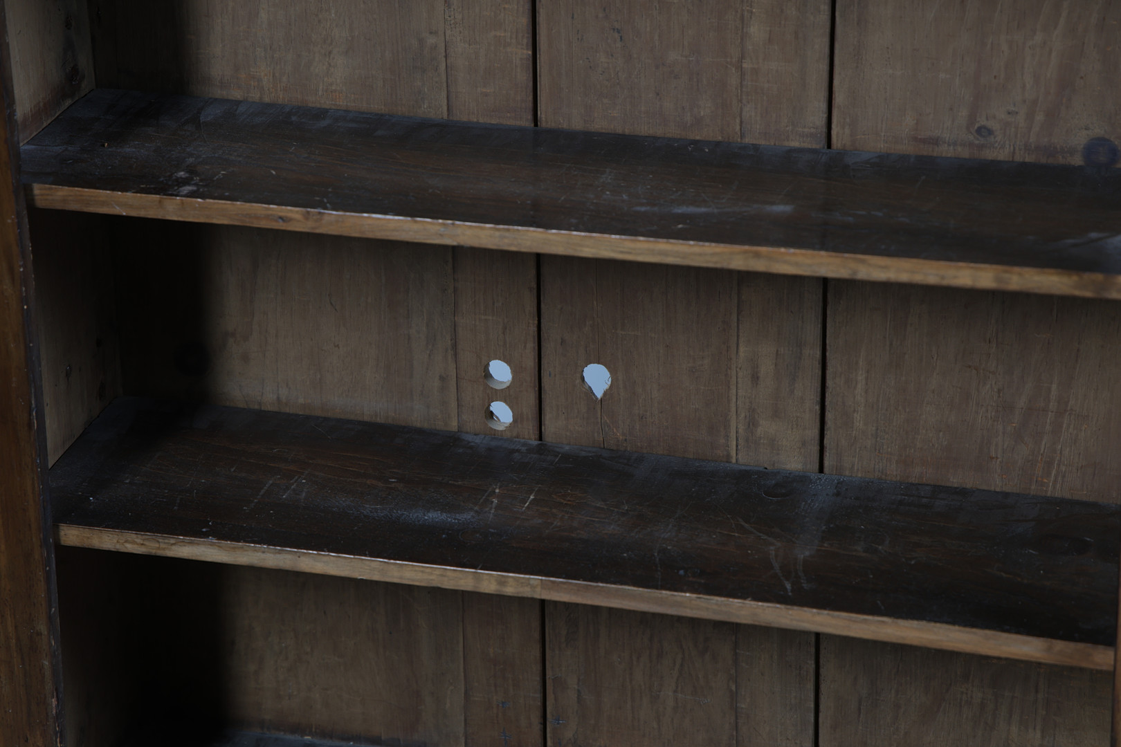 A 19TH CENTURY WALNUT OPEN BOOKCASE.