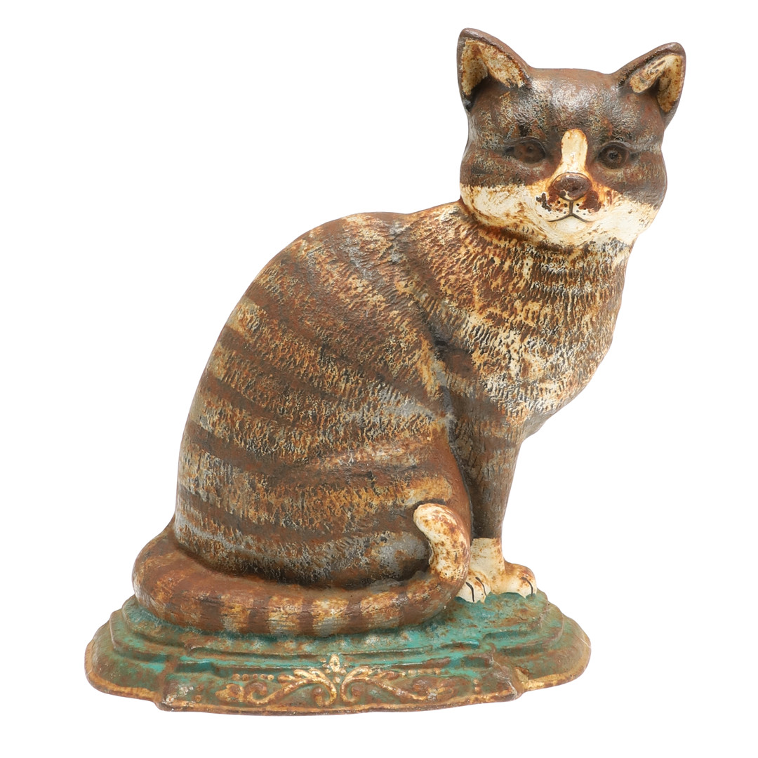 A PAINTED CAST IRON DOOR STOP IN THE FORM OF A CAT.