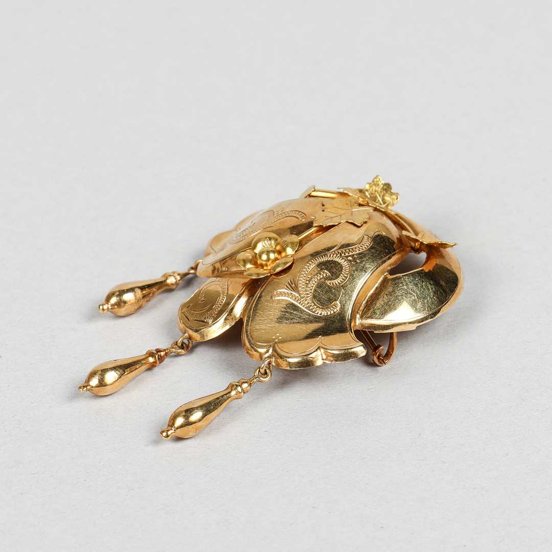 BROSCH 18k guld.