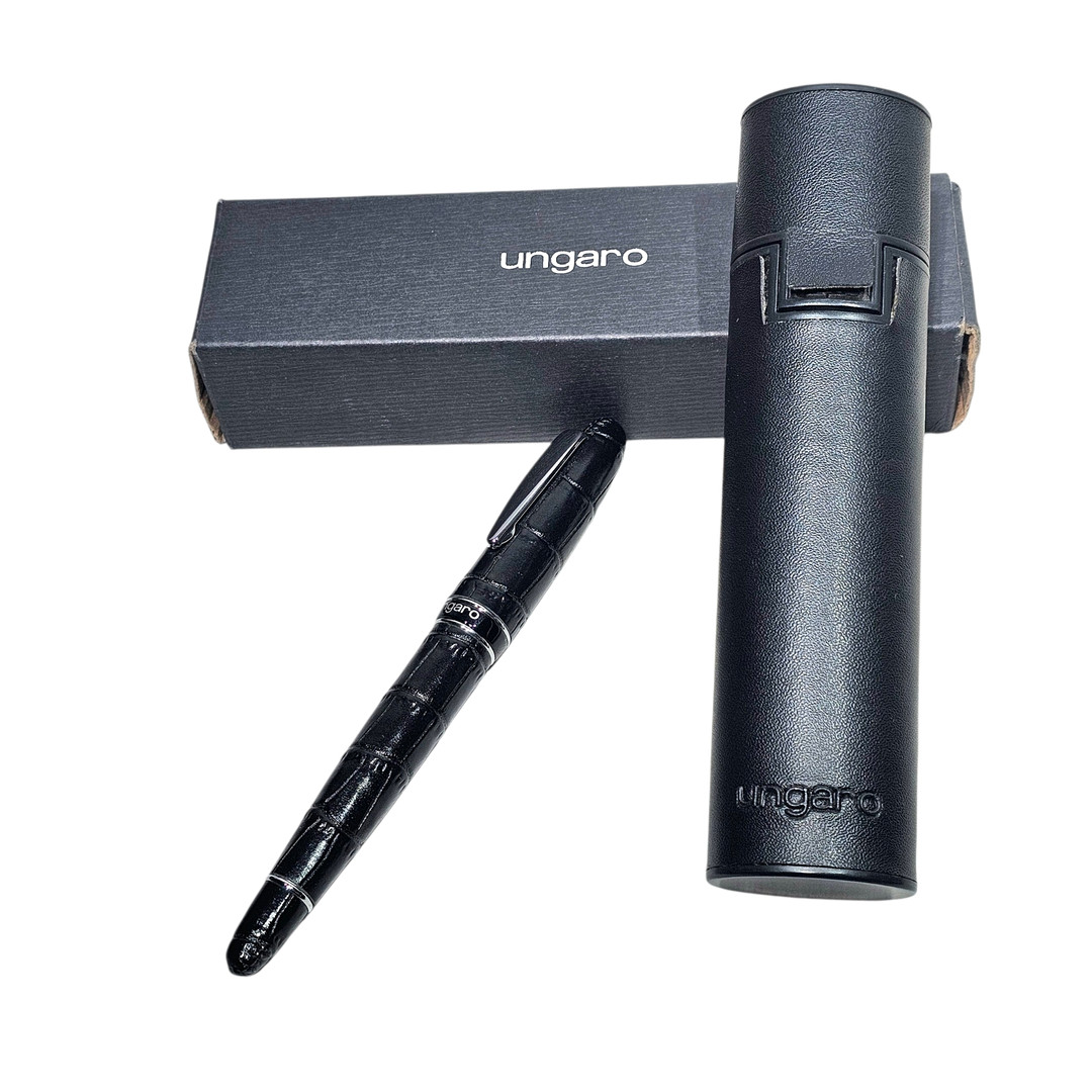 Ungaro. Roller en acero y piel negra. Con estuche original.