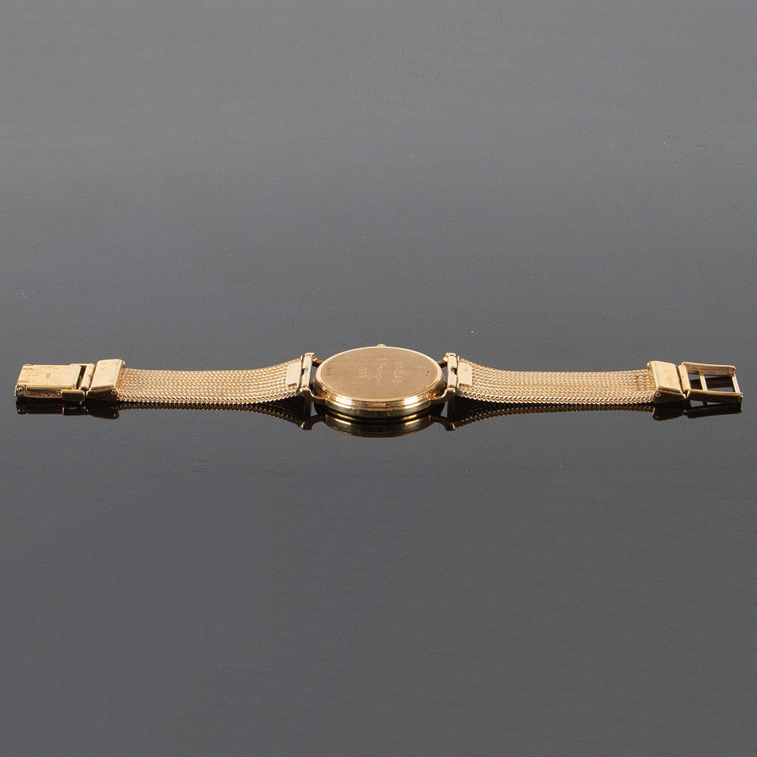 Omega 18 k guld.