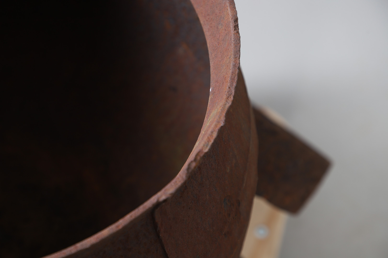 A CAST IRON CAULDRON ON STAND.