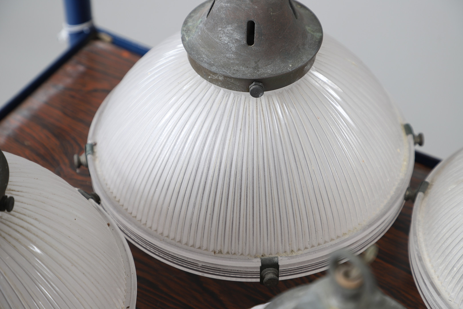 A SET OF FIVE HOLLOPHANE TWO-PART CEILING PENDANT LIGHTS, CIRCA 1930.