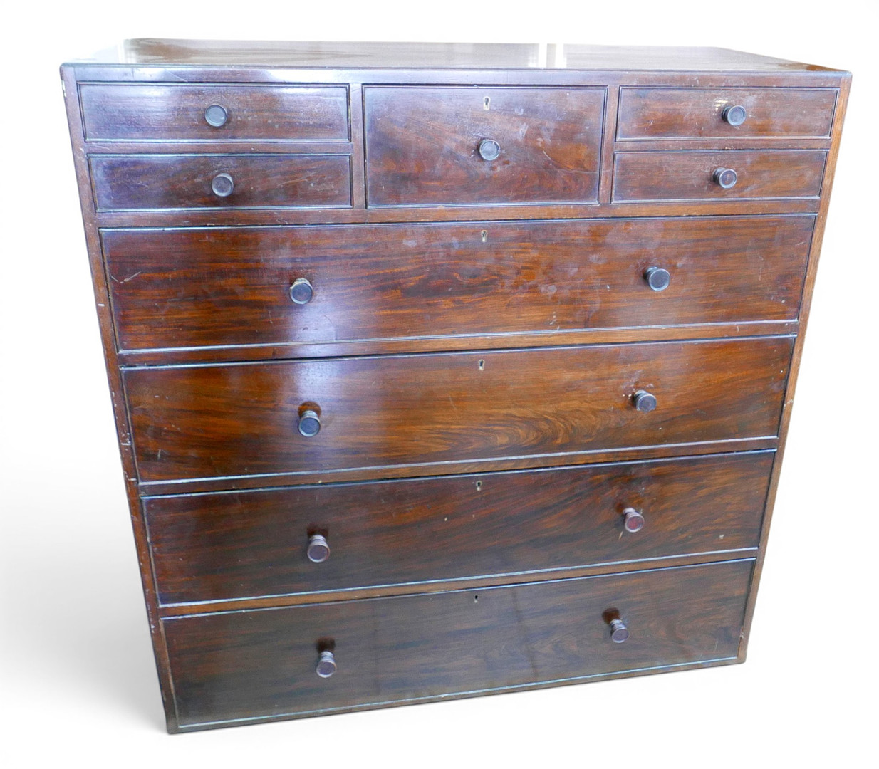 AN EDWARDIAN MAHOGANY CHEST OF FIVE SMALL OVER FOUR LONG DRAWERS.