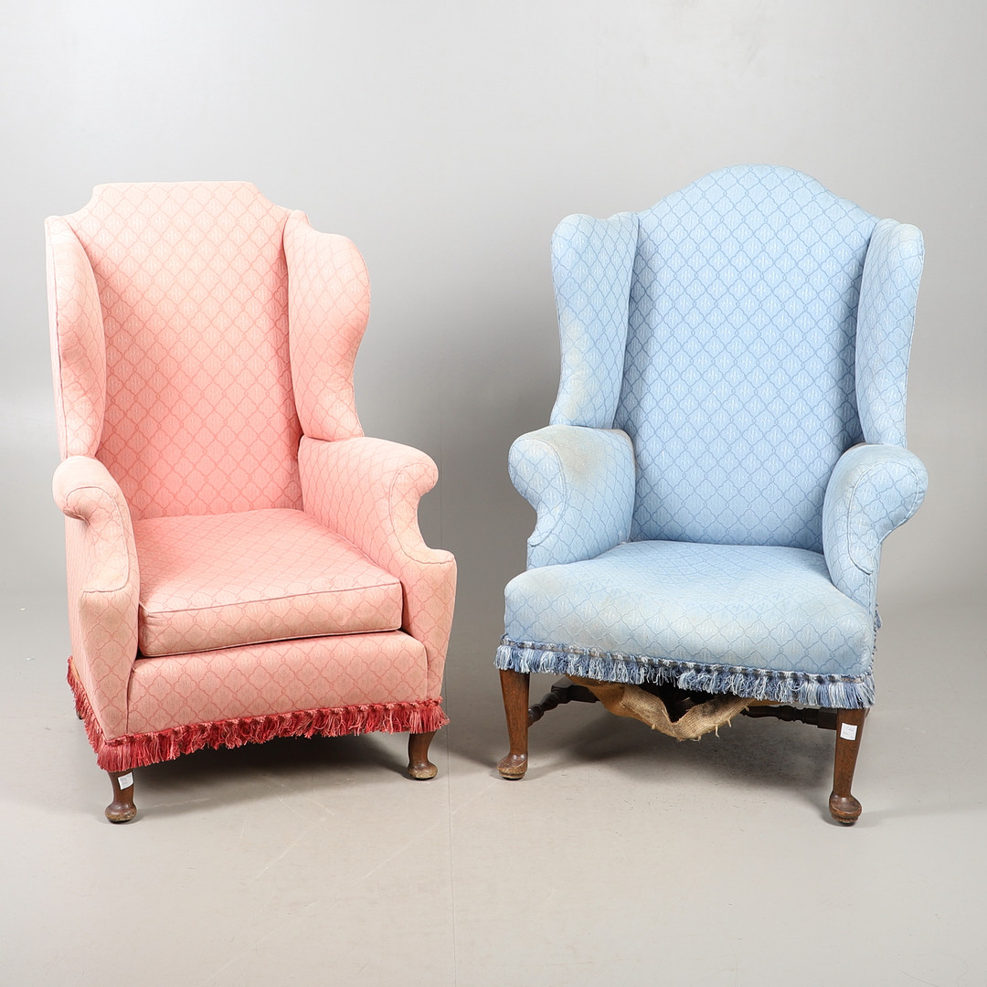A NEAR PAIR OF VICTORIAN WING BACK ARMCHAIRS.