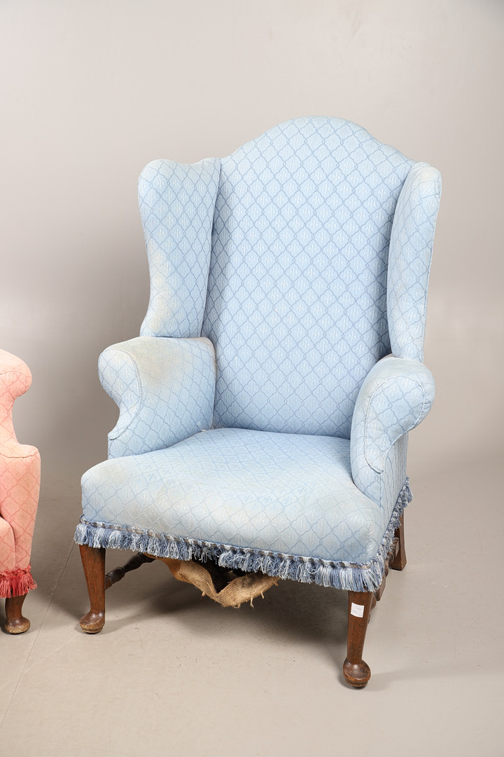 A NEAR PAIR OF VICTORIAN WING BACK ARMCHAIRS.