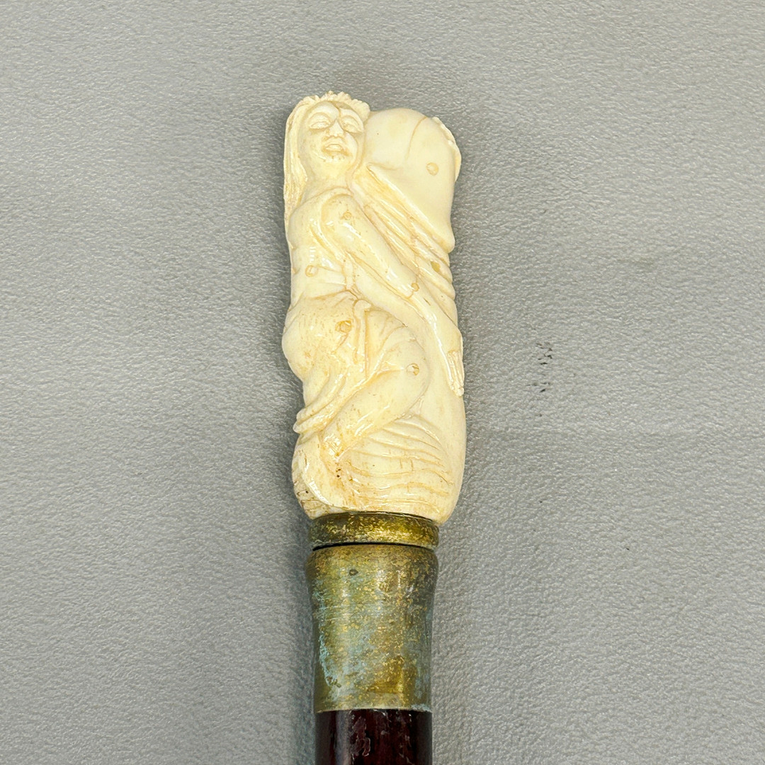 EROTIC BONE HANDLED WALKING STICK.
