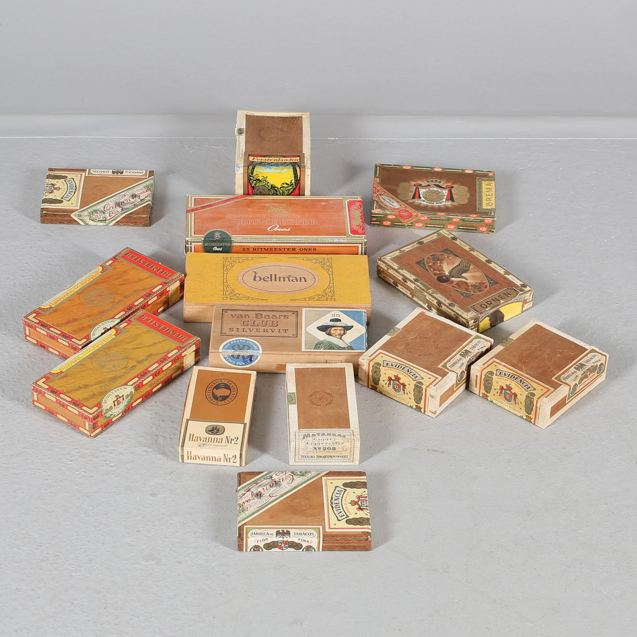 CIGAR BOXES, 14 pcs., wood/paper, 1900s.