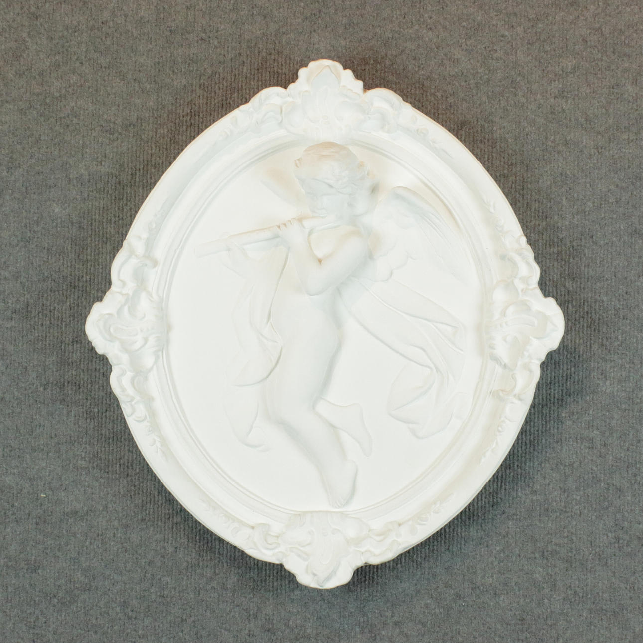 WALL PLAQUES, a pair, plaster, playing cupids.