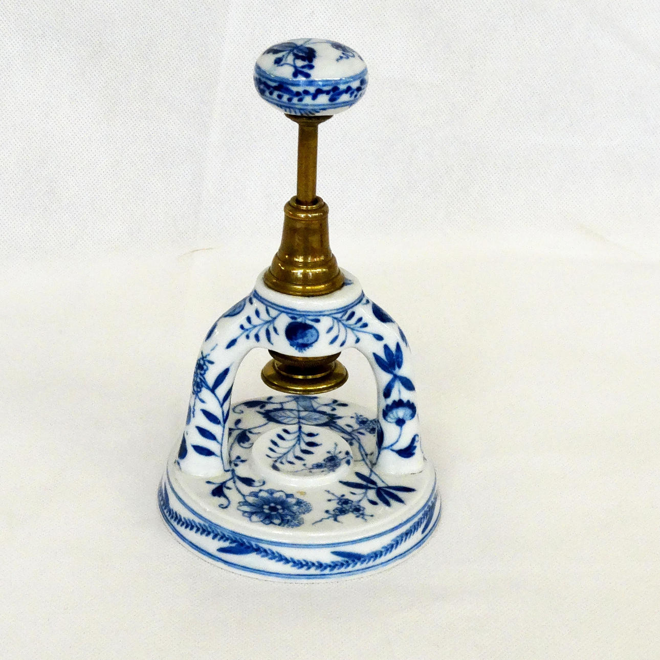 PORCELAIN AND BRASS NUTCRACKER, circa 1800.