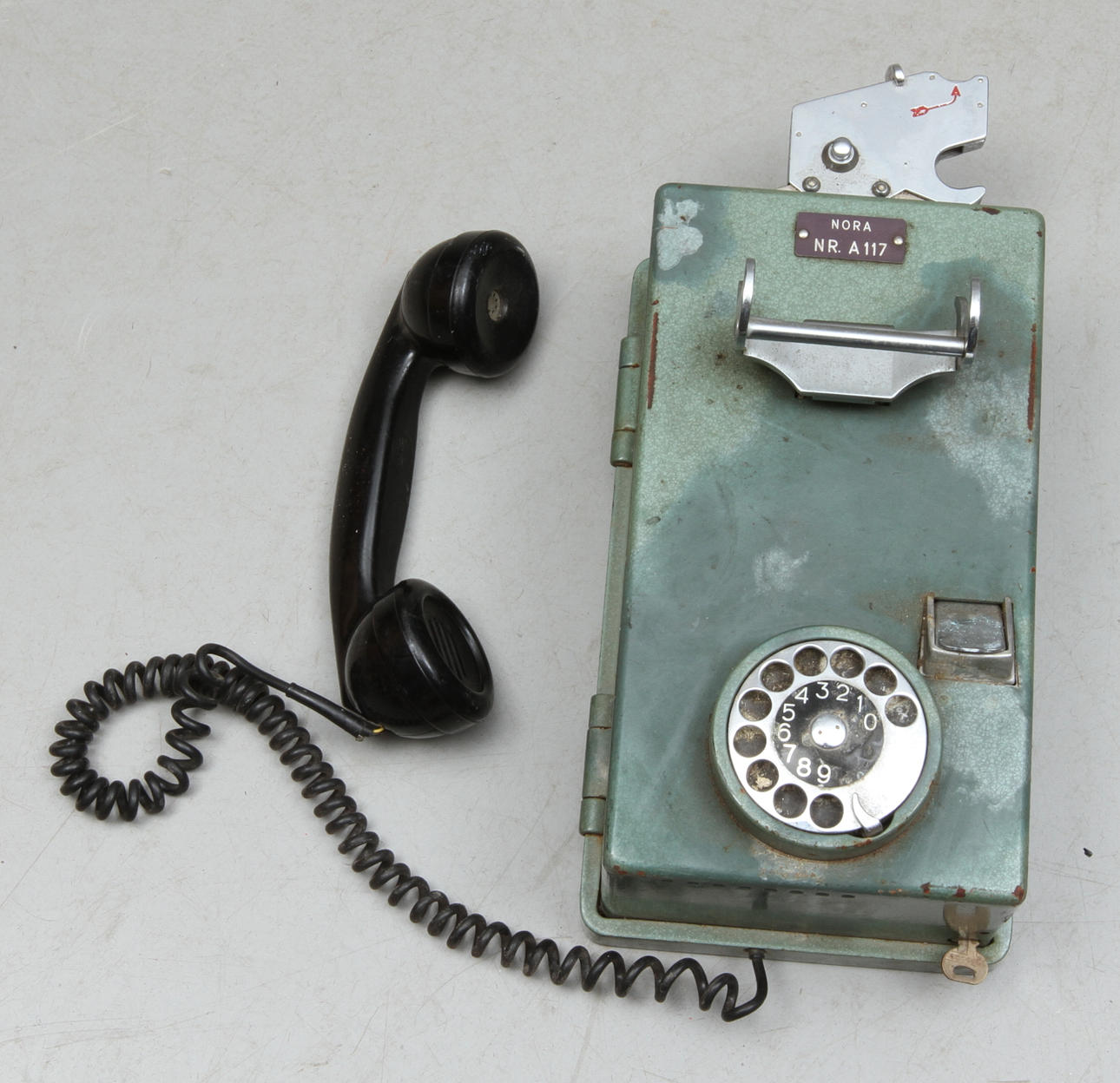 MYNTTELEFON, 1900-tal.