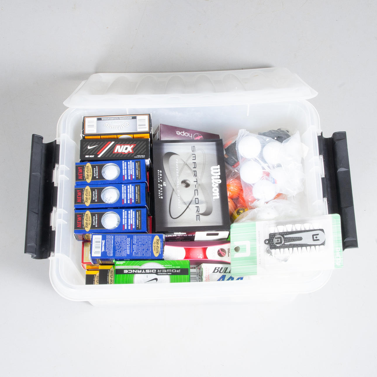 GOLF BALLS AND PEGS, i.a. Wilson.