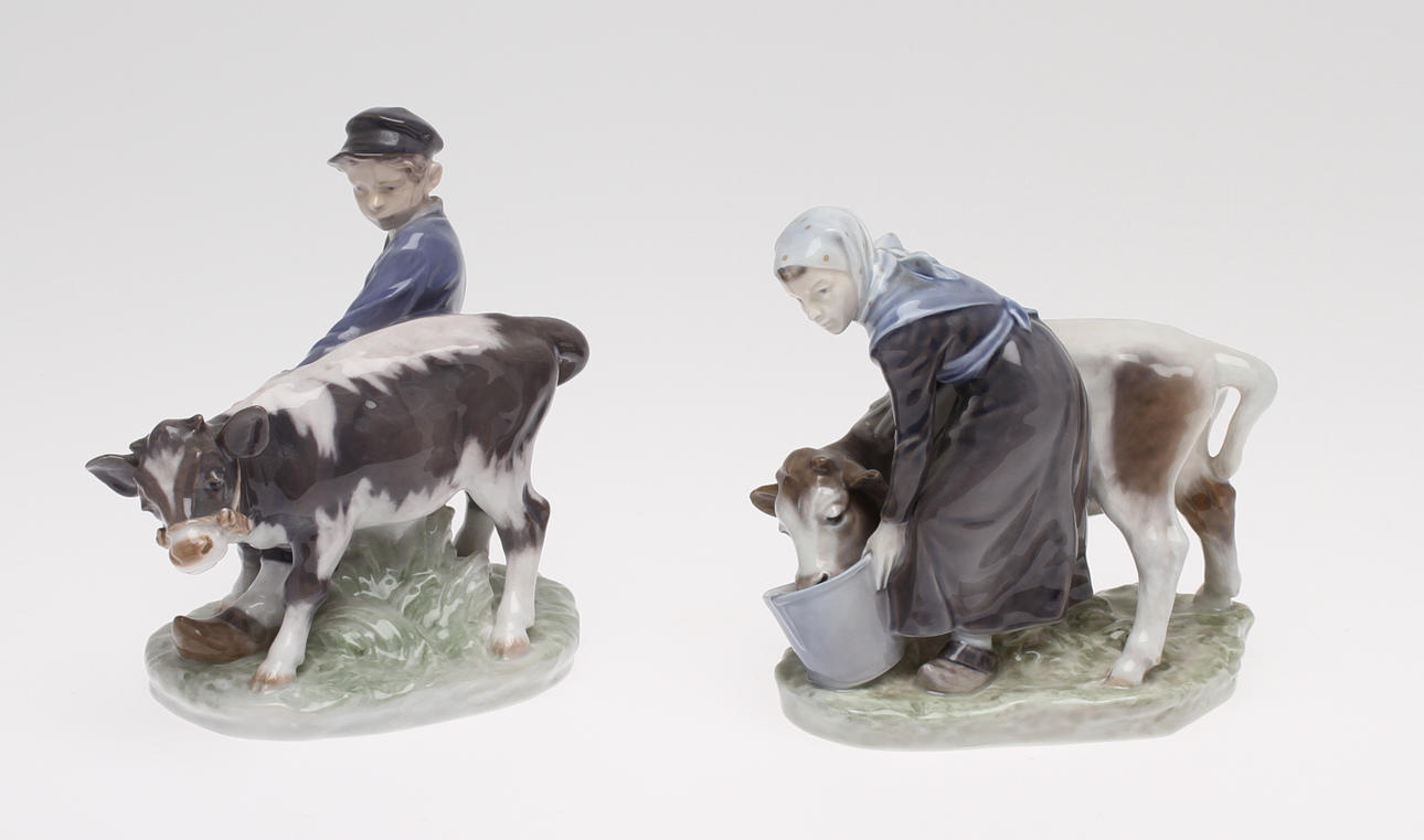 FIGURINER, 2 st, porslin. Pojke samt flicka med kalv. Christian Thomsen, Royal Copenhagen.