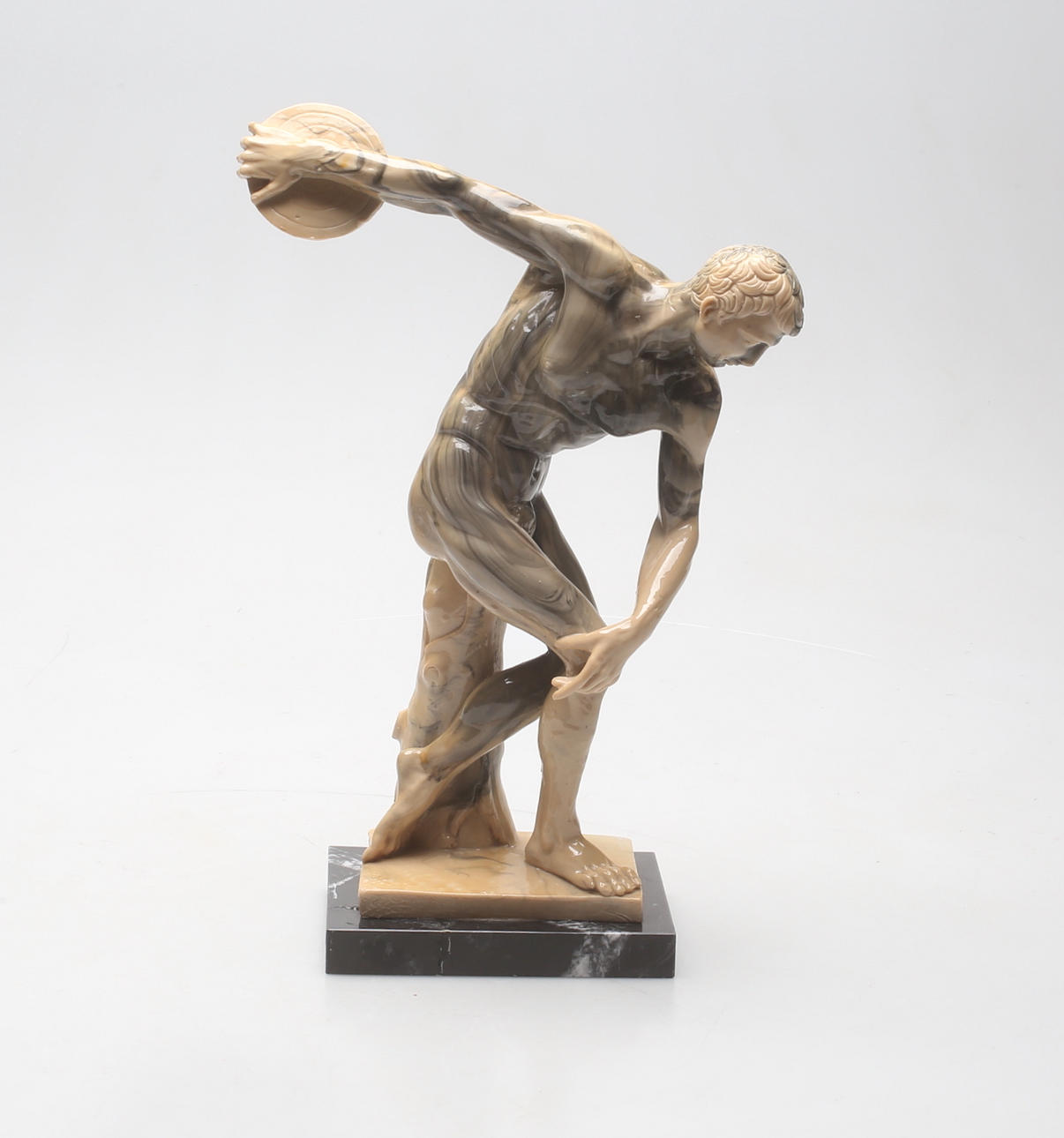 SKULPTUR. Diskoskasteren, plastik.