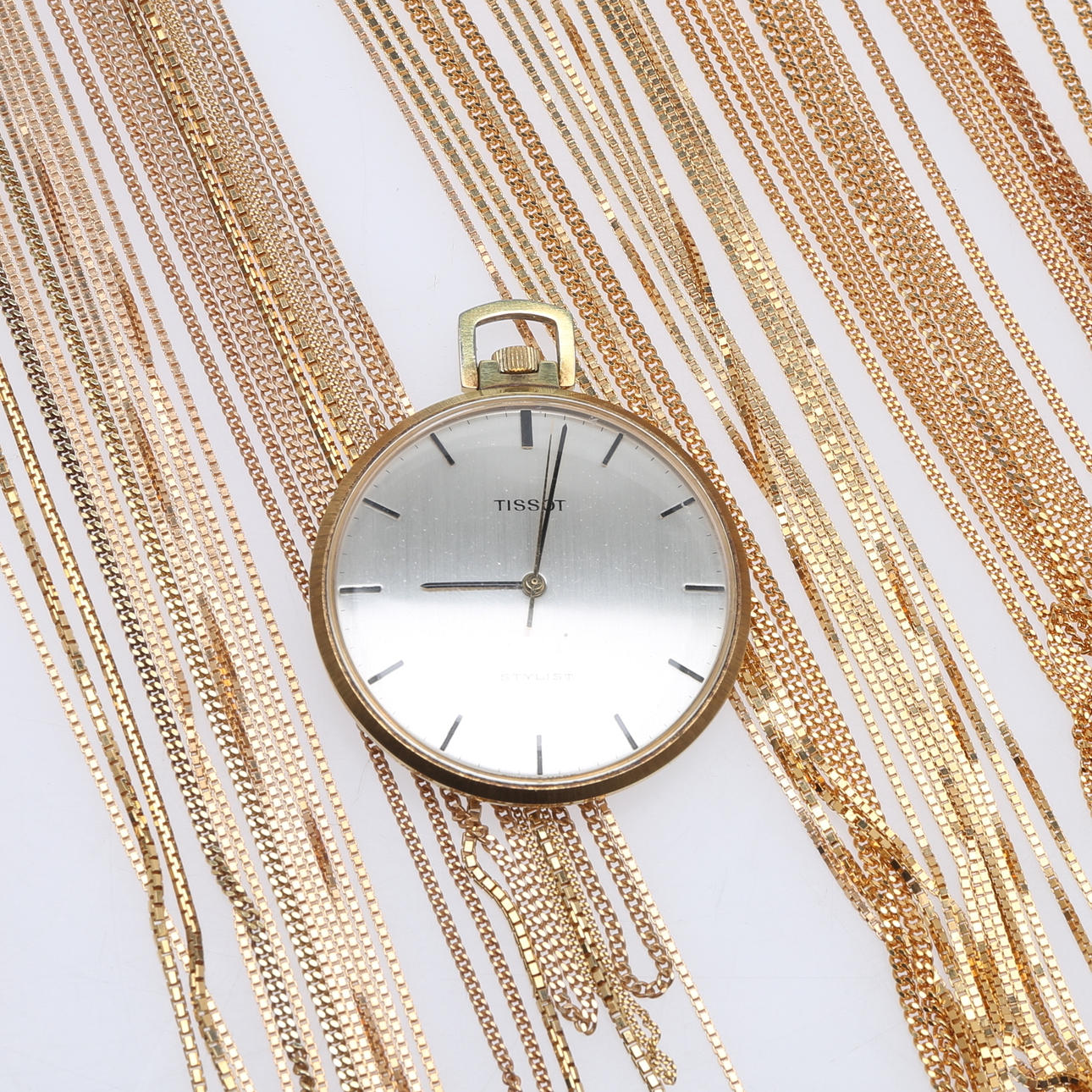 FRACKER, TISSOT, "Stylist, gulddobbelt.