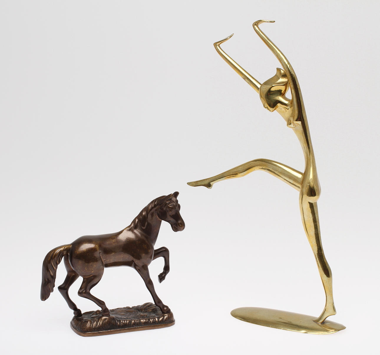 FIGURINER, 2 st, metall. Häst, osignerad samt Kvinna, osignerad.