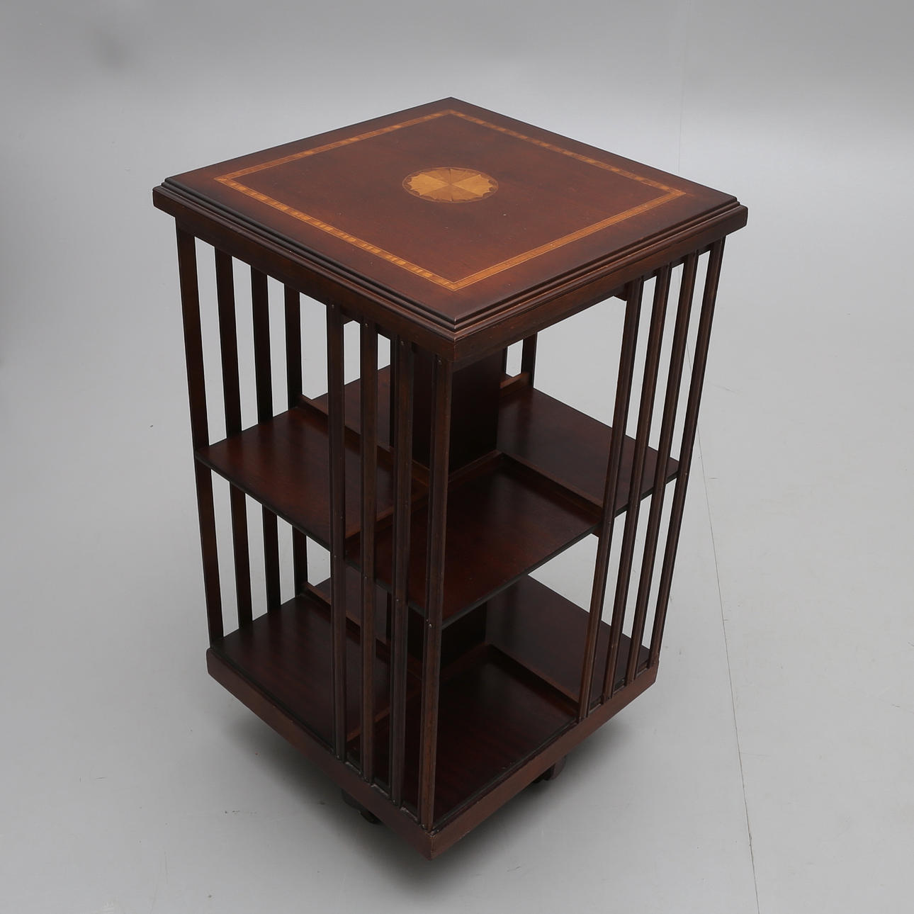 BOOKSPIN, MAHOGANY WITH INLAYS.