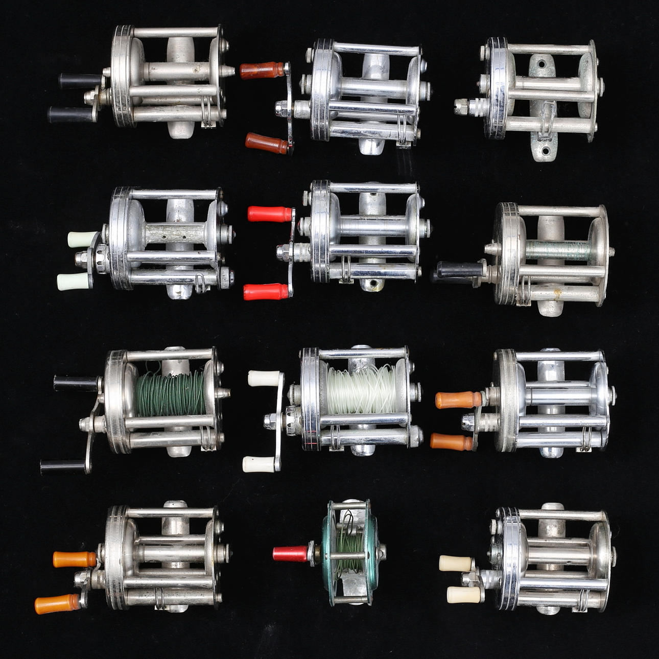 CARRETES DE PESCA, 12 piezas, "Caster", "Spinner", "Special", etc., Radius.