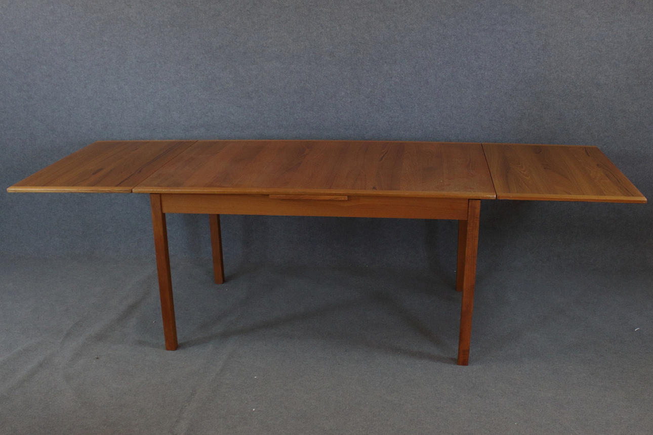 DINING TABLE, teak veneer, extendable, seats 10, 1970s-80s.