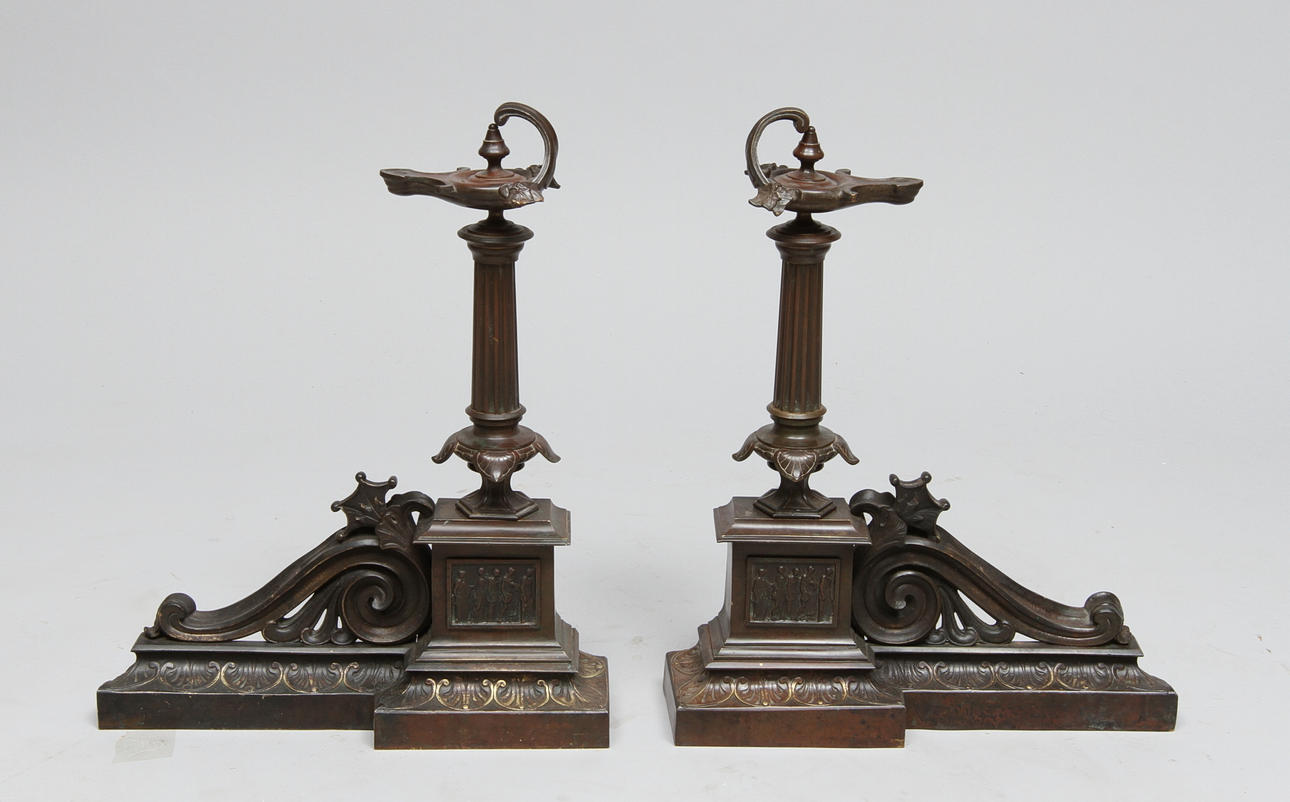 SPISGARNITYRER, 1 par, brons, efter antiken. 1800-tal.