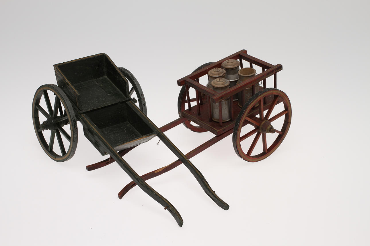 VAGNAR 2 stycken för hästspann, en med last av mjölkkannor, 1890 - 1920.