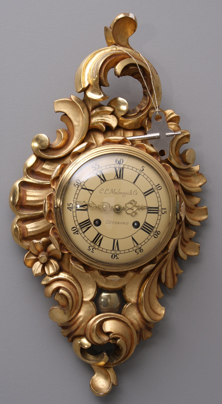 VÄGGUR, sk guldpendyl, förgyllt trä/pastellage, C.L.Malmsjö&Co Göteborg.