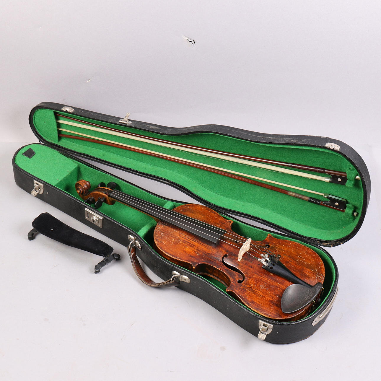 VIOLIN with bow, 20th century.