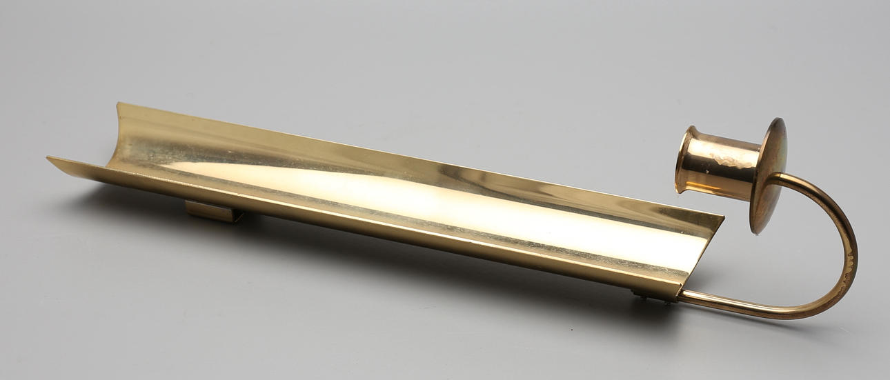 VÄGGLAMPETT, mässing, Pierre Forsell, Skultuna, 1982.