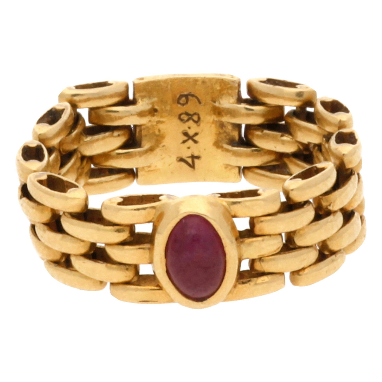 Gold mesh and ruby ring.