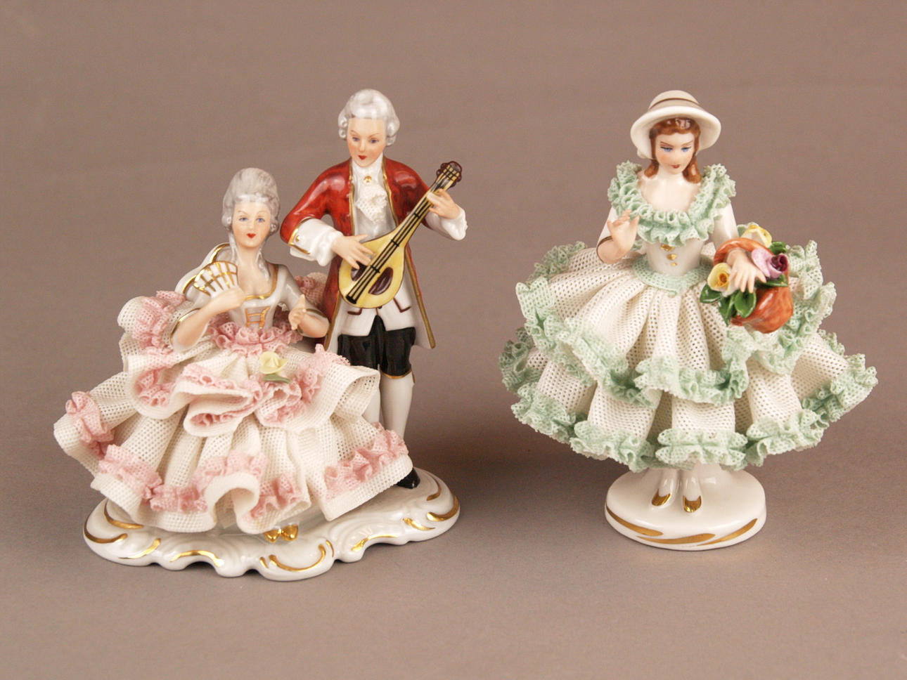 TWO PORCELAIN FIGURES - DRESDEN, both polychrome and gold.