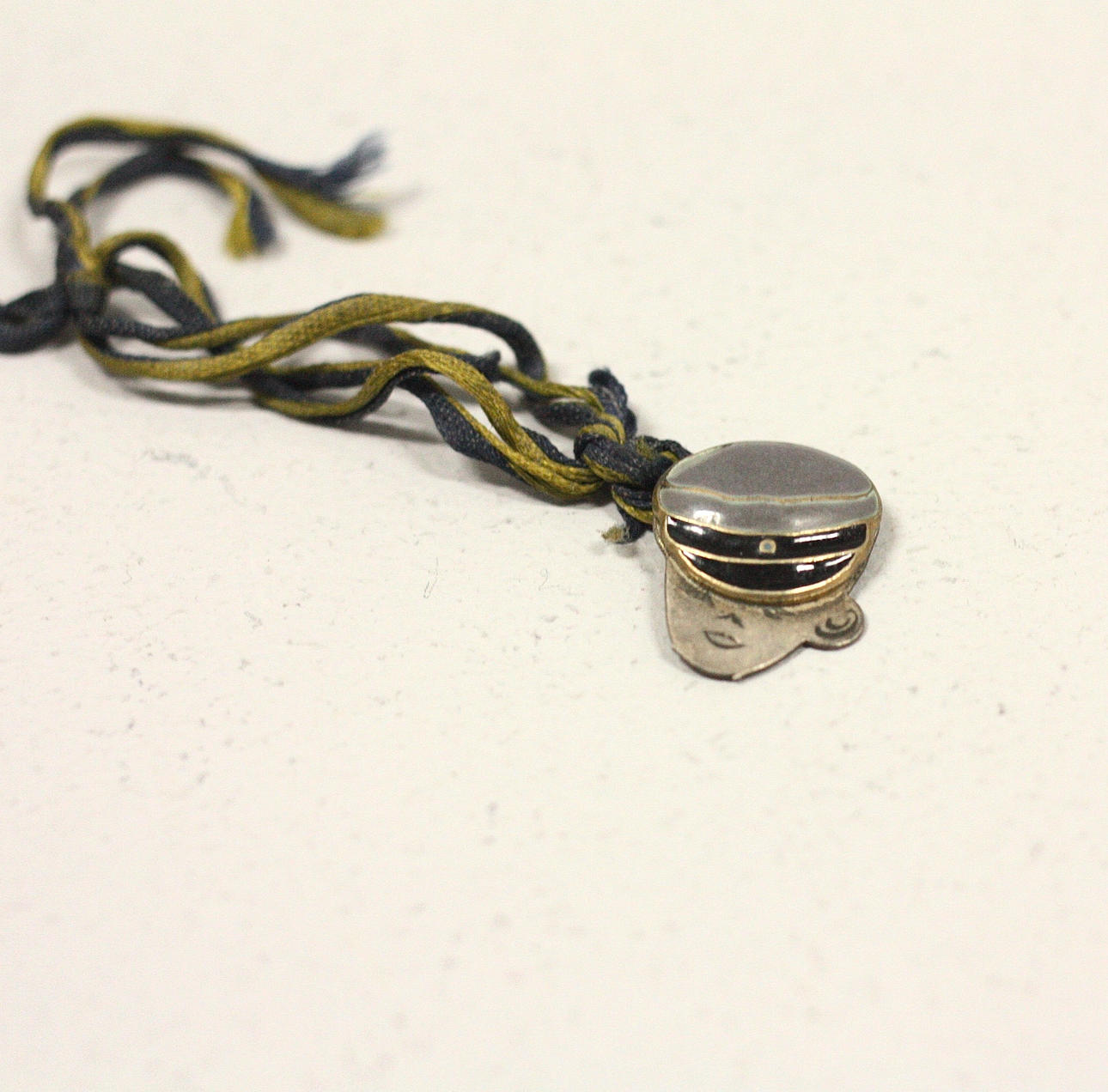 STUDENTSMYCKE silver 1900-talets mitt.