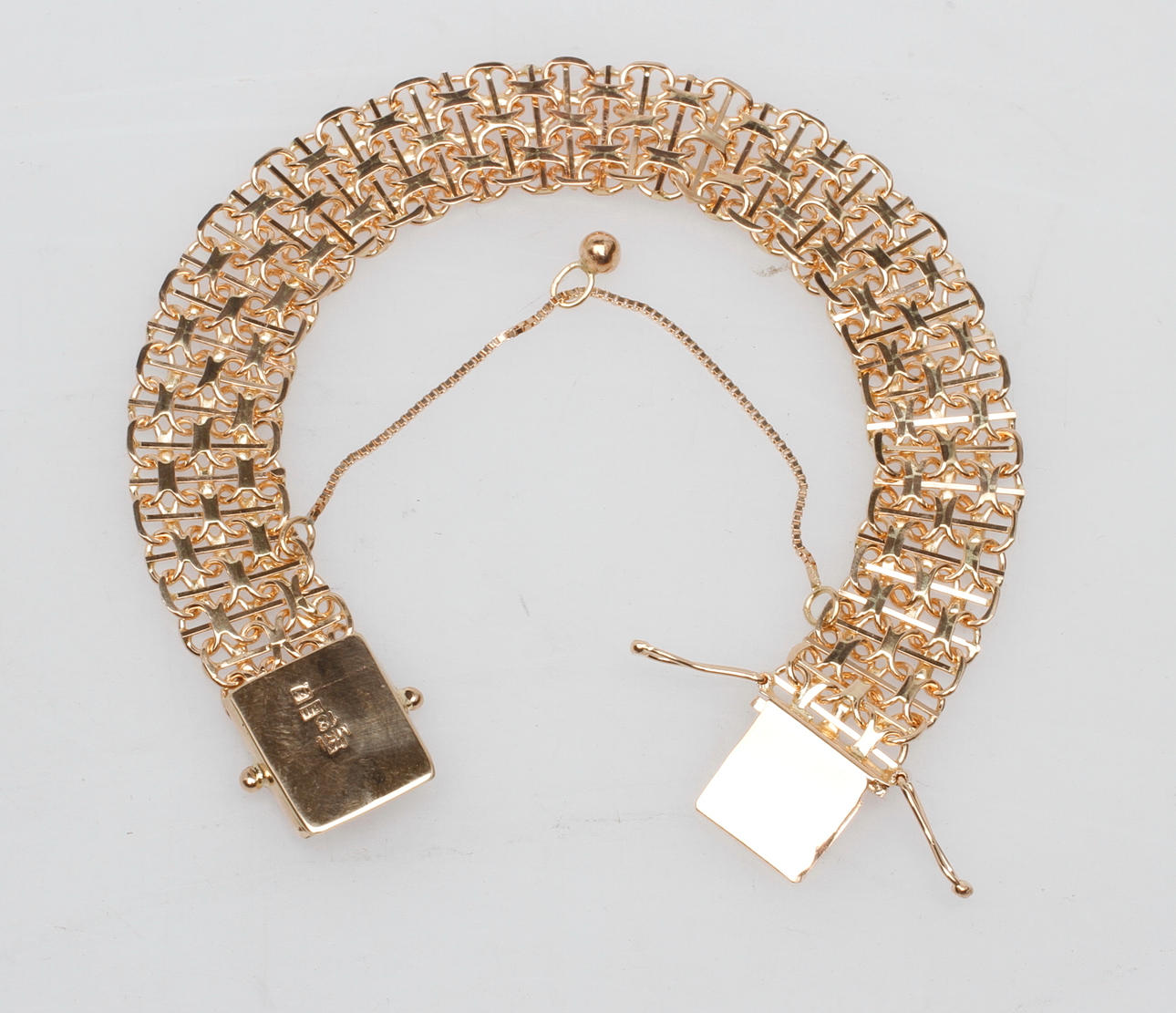 ARMBAND X-LÄNK MED STAV, 18k guld, vikt ca 25,3 gr.