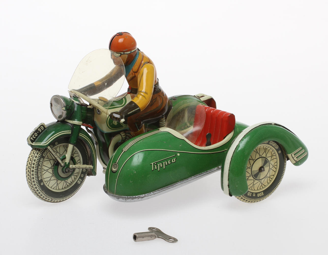 TIPPCO MOTORCYKEL TCO-59 i plåt med vindruta. Urverk. "Made in U.S.-zone Germany".