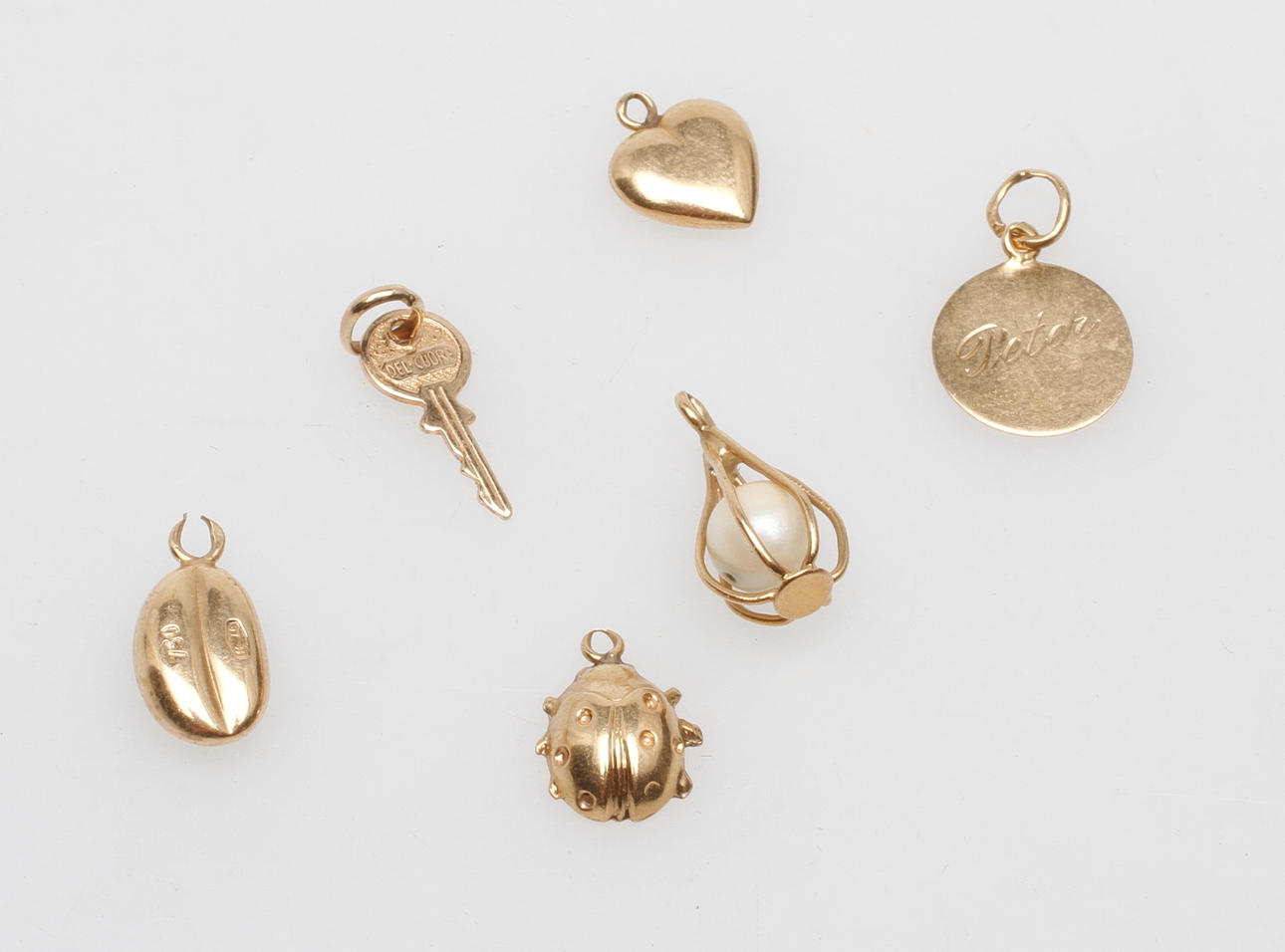 BERLOCKER, 6 stk, 18k guld, vægt ca. 2,9 gr.