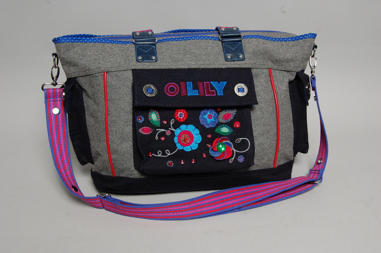 TASKE, "OILILY" ny stand.