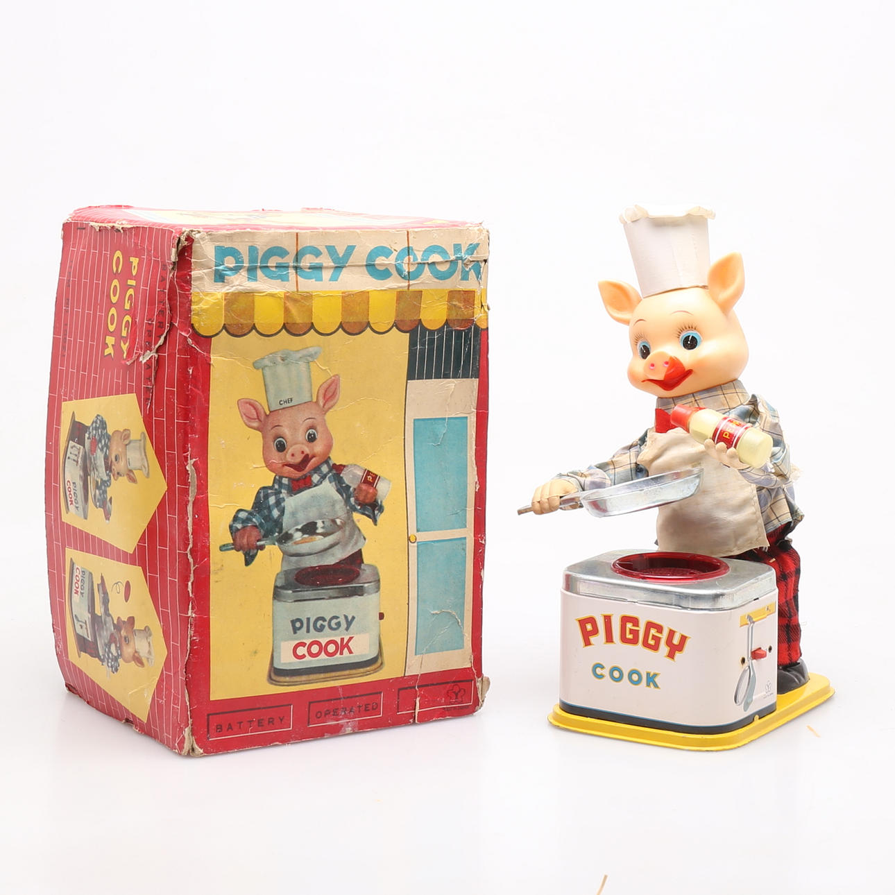 JUGUETE, cerdito cocinero.