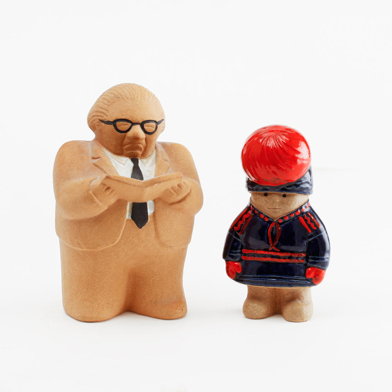 PURCHASE "GUNNAR STRÄNG" and the FIGURINE in the shape of a Sami boy, stoneware. Lisa Larson for Gustavsberg.
