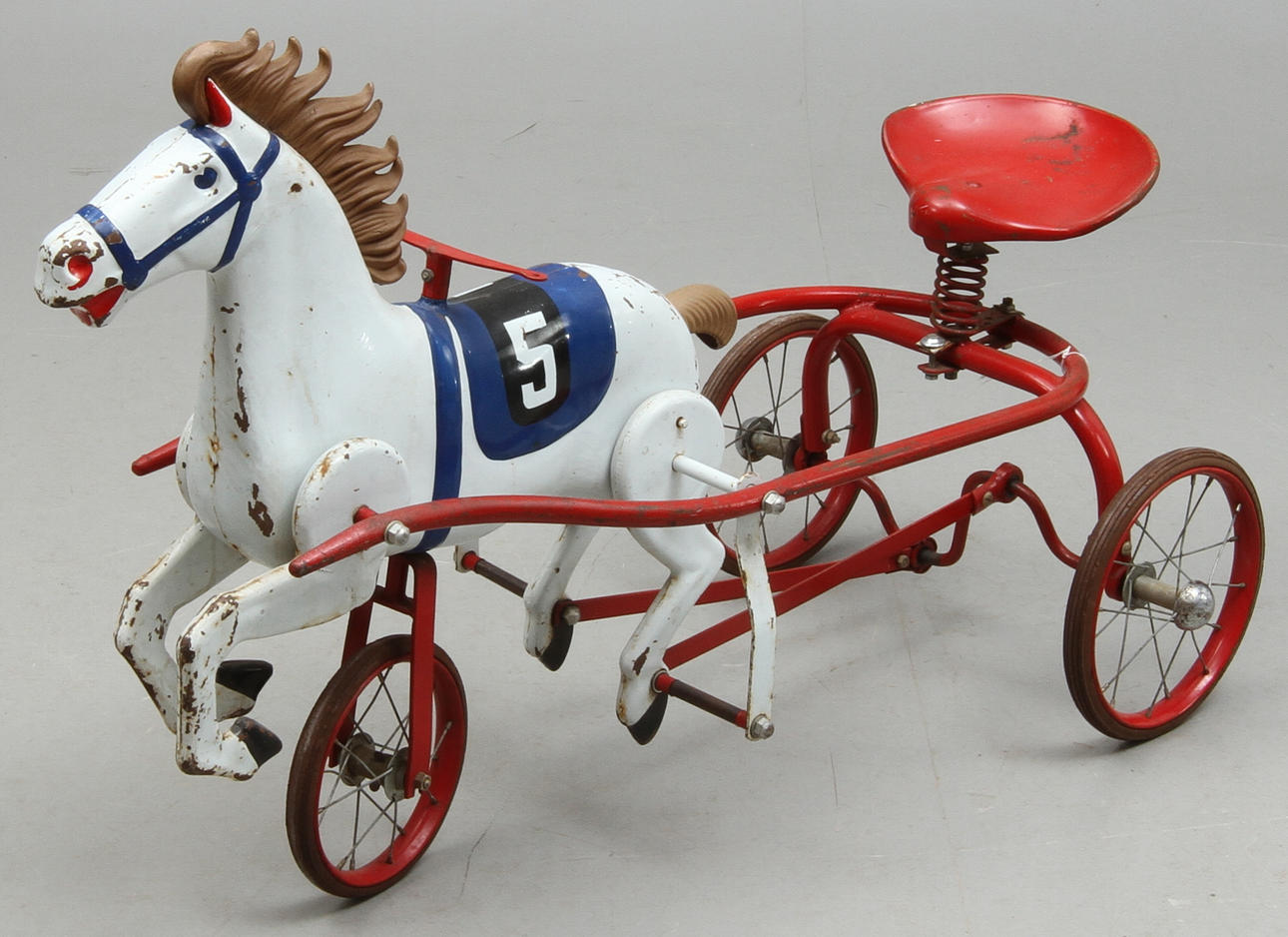 TREHJULING, plåt, i form av häst, 1900-tal.