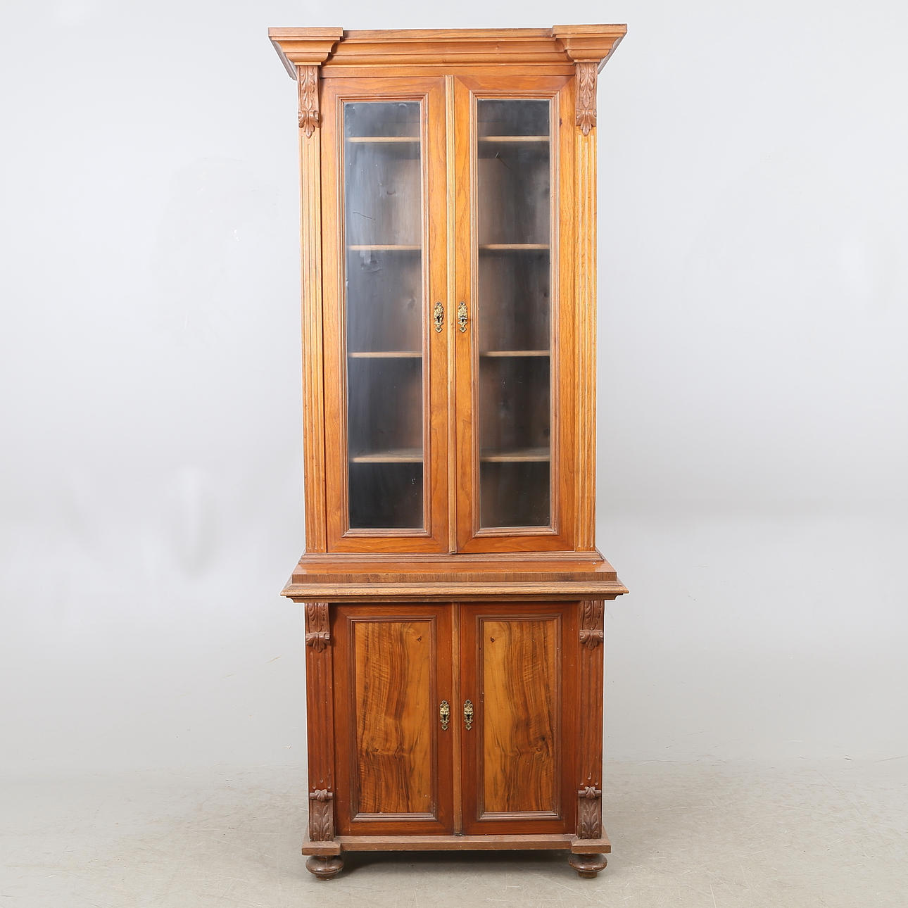 BOKSKÅP med glasdörrar, ca 1900.