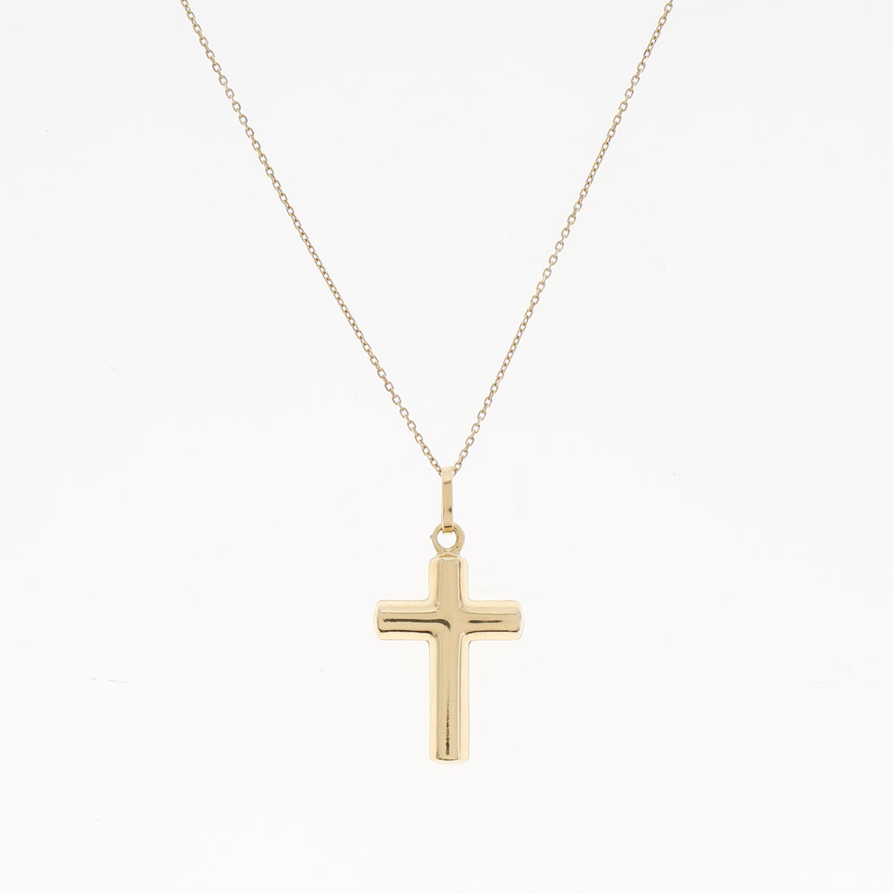 Guld kors hänge.
