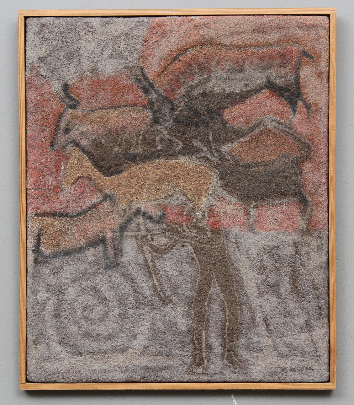 OKÄND KONSTNÄR. Motiv med jägare och bufflar. Kolorerad sandgjutning. Otydligt signerad samt handavtryck a tergo.